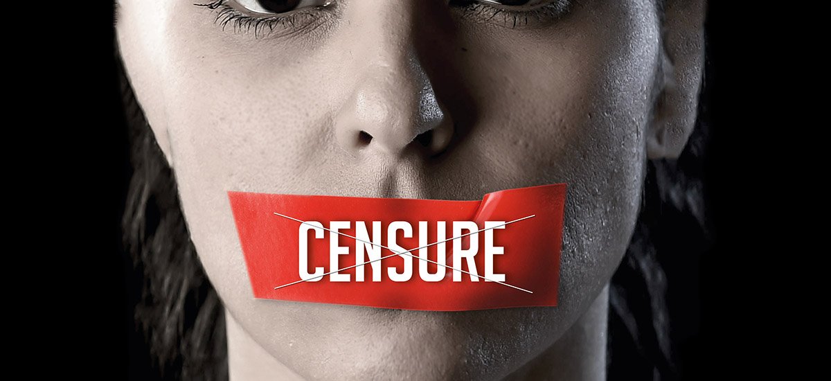 Photo d'une femme bâillonnée par une étiquette où il est écrit "Censure"